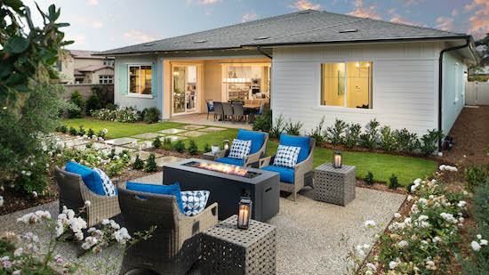 Backyard and exterior image of 12 Pacific model home