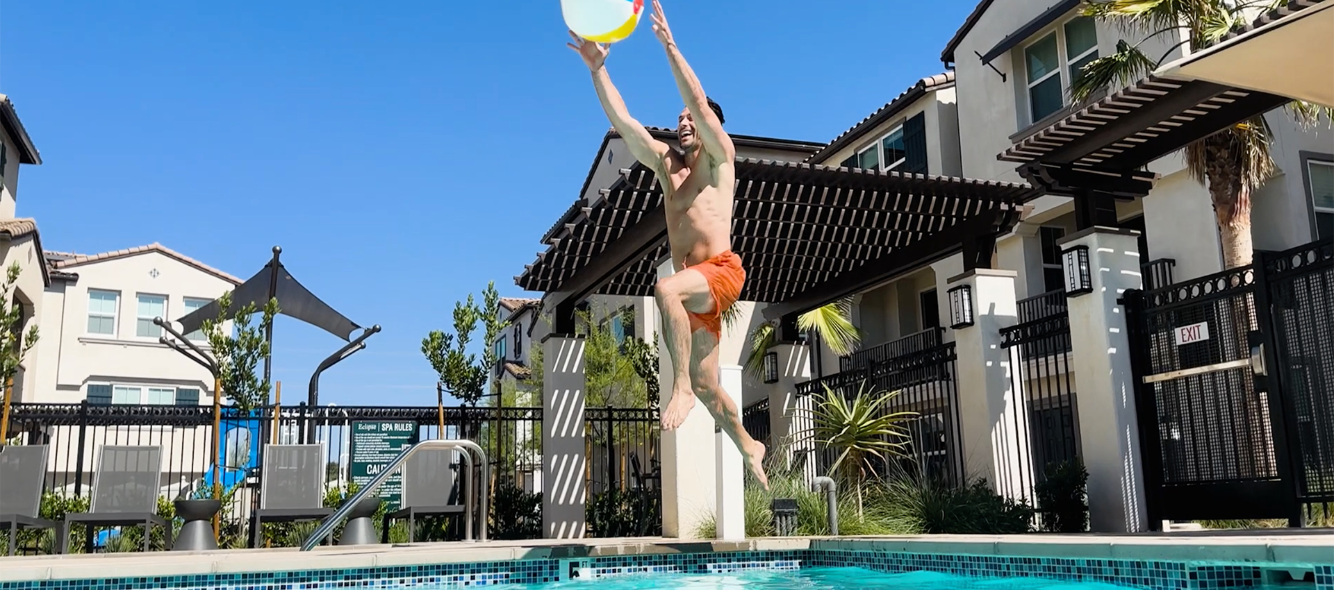 Man jumping into the pool at Eclipse