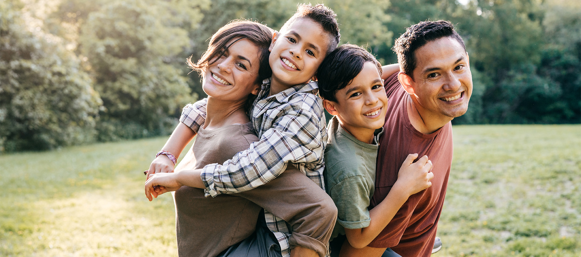 Family posing in a field image