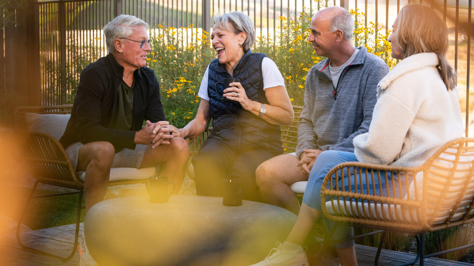 Image of two couples laughing together