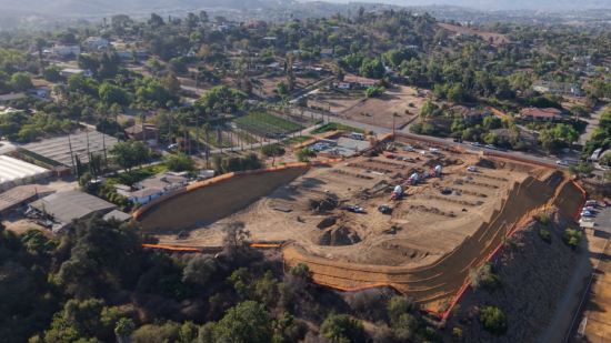 Construction site in Vista with palm trees 